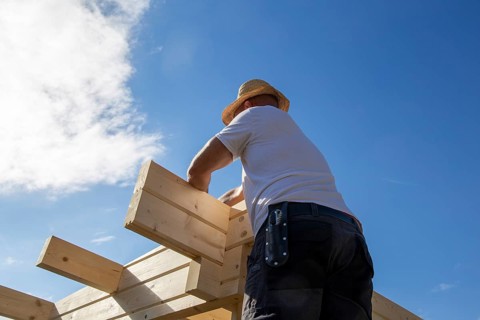 Timber construction: Carpenters assembling a garden sauna in Mutterstadt in the Rhein-Pfalz