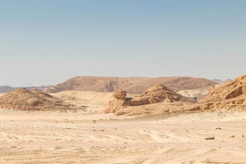Desert, red mountains, rocks and blue sky. Egypt, the Sinai Peninsula, Dahab