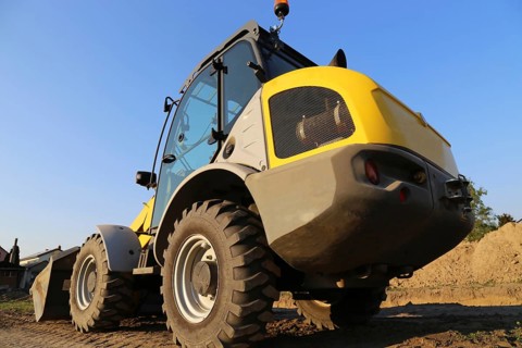 Wheel loader at sunset, here in the Ringstrasse development area (Mutterstadt,