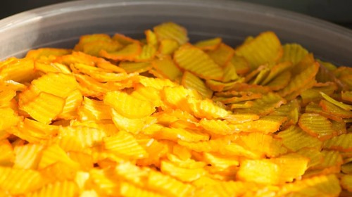 Chinese and Asian food on the market, rice, chips, noodles, sweets