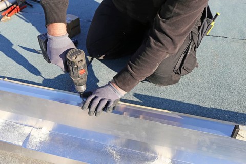 Tinsmith work on a flat roof