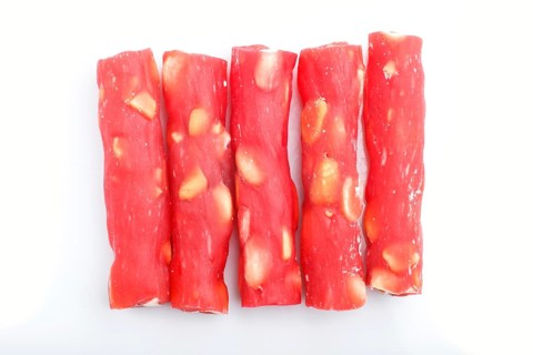 Red traditional turkish delight (rahat lokum) with peanuts isolated on white background. top view,