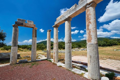 Historical column ruins in front of a sunny sky in Greece, Stoa of the Agora, Archaeological site,