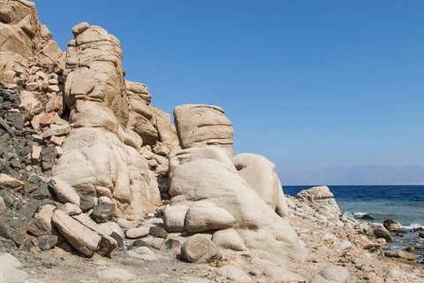 The coastline of the Red Sea and the mountains in the background. Egypt, the Sinai Peninsula, Dahab