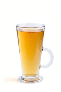 Glass of green grape juice isolated on white background. Morninig, spring, healthy drink concept.