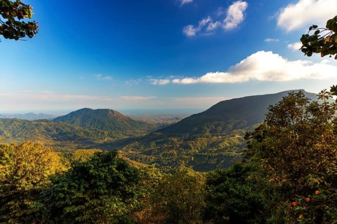 View over the mountains to the sea, Pluma Hidalgo, Pochutla, Oxaca state, Sierra Madre del Sur,