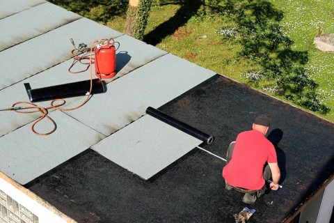 Professional flat roof waterproofing with bitumen welding membranes
