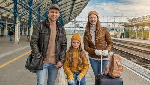 AI generated, A young family wants to travel and waits in the station for the train, 30, 35, years,