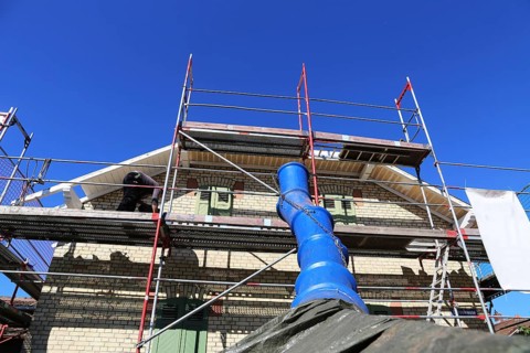 Debris chute for disposing of building rubble
