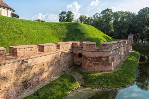 Ancient restored castle with a moat in the Nesvizh city. Belarus