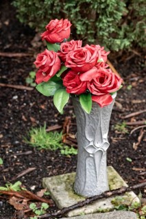Artificial roses in a flower vase