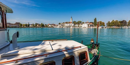 Motorboat in front of the town of Romanshorn, Lake Constance, Canton Thurgau, Switzerland, Europe