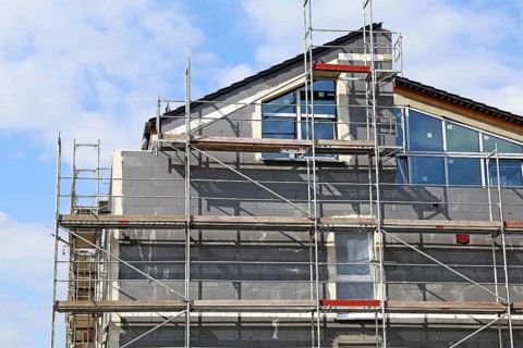 Thermal insulation of a house facade