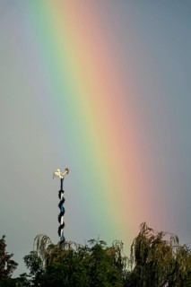 Figure of a rooster, weathercock on maypole in front of rainbow, Marzling, Upper Bavaria, Bavaria,