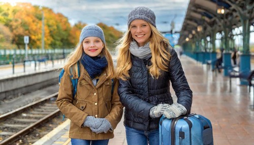 AI generated, Two young blonde woman want to travel and wait for the train at the station, 18, 25,