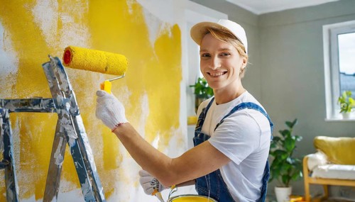 AI generated, man, men, a painter paints a wall with new yellow paint, father, renovation of old