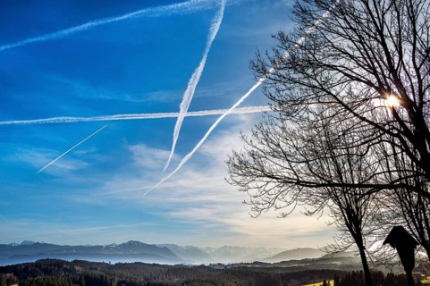 Condensation trails and Alpine panoramas, Buchenberg, Allgaeu, Bavaria, Germany, Europe