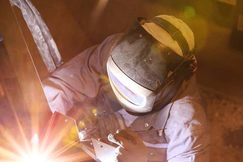 Metal worker during welding work
