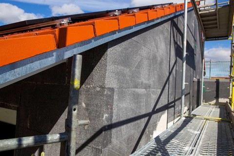 Thermal insulation of a house facade