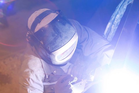 Metal worker during welding work