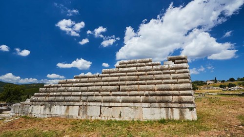 Steps of an ancient theatre under a blue sky in Greece, Archaeological site, Ancient Messene,