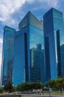 Blue glass skyscaper in the center of Singapore
