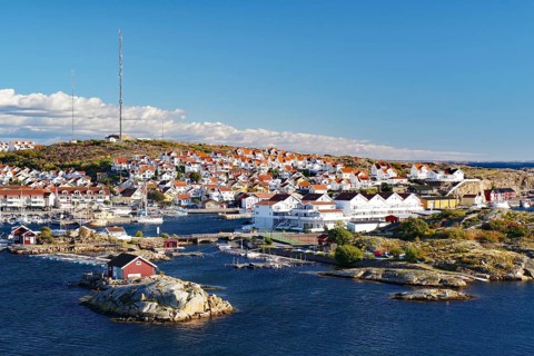 View over rocks and a small town with white houses, Vaestra Goetalands Laen, Sweden, Europe