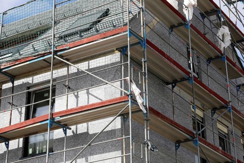Thermal insulation of a house facade
