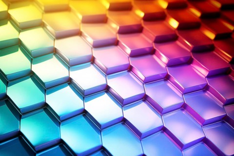 Gradient honeycomb pattern illuminated with vibrant colors. Ideal for backgrounds, wallpapers, and