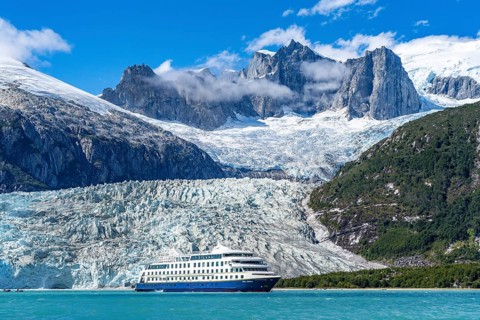 Cruise ship Stella Australis anchors in front of the Pia Glacier, Alberto de Agostini National