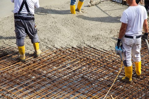 Delivery of ready-mixed concrete to the construction site of a residential building in a new