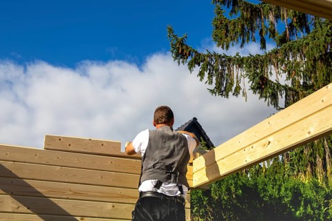 Timber construction: Carpenters assembling a garden sauna in Mutterstadt in the Rhein-Pfalz
