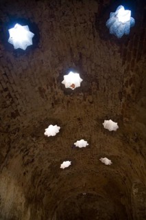 Star shaped skylights in vaulted roof of Arab Baths, Banos Arabes, Ronda, Spain, Europe