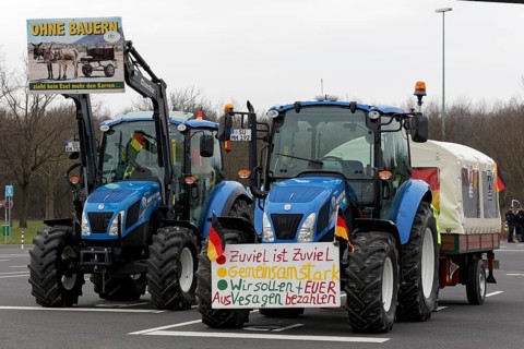 Tractor with sign, Too much is too much, Farmer protests, Demonstration against policies of the