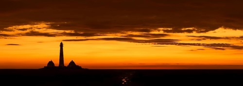 Lighthouse Westerheversand at sunset in summer, Westerhever, Wadden Sea National Park, North