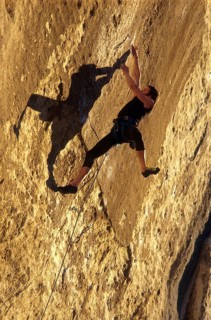 Climber in route called La Rose et le Vampir, 8b, in Buoux, Haute Provence, France, vintage, retro,