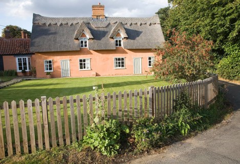 Pretty thatched cottage in the village of Ufford, Suffolk, England, United Kingdom, Europe