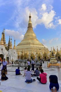 Pilgrims in the Shwedagon Pagoda, Yangon, Myanmar, Asia