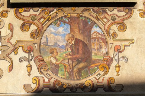 Stein am Rhein, historic old town, Haus Buerger-Asyl, old man, boy, apple, bench, wall painting,