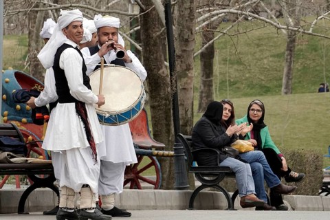 Musicians in traditional dress play music in a park in Tehran, Iran, woman, 14.03.2019, Asia