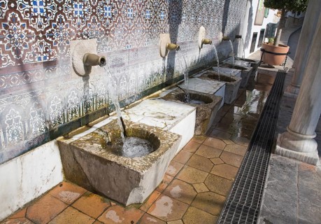 Moorish water fountain in the Andalucian village of Alcaucin, Malaga province, Spain, Europe