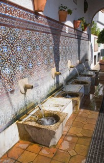 Moorish water fountain in the Andalucian village of Alcaucin, Malaga province, Spain, Europe