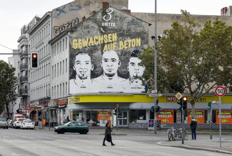 A picture of the brothers Jerome Boateng, George Boateng and Kevin-Prince Boateng can be seen on a