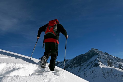Snowshoe hiking in the Beverin nature park Park, Graubuenden, Switzerland, Europe