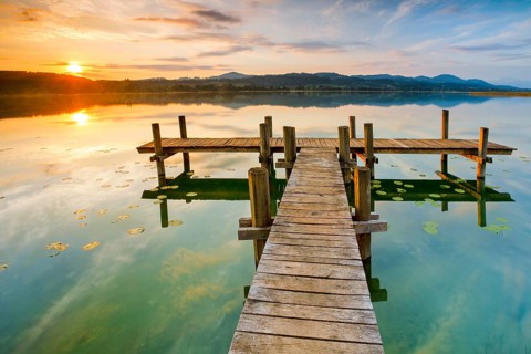 Wooden footbridge on Lake Pfaeffikon at sunrise, Pfaeffikon, Canton Zurich, Switzerland, Europe