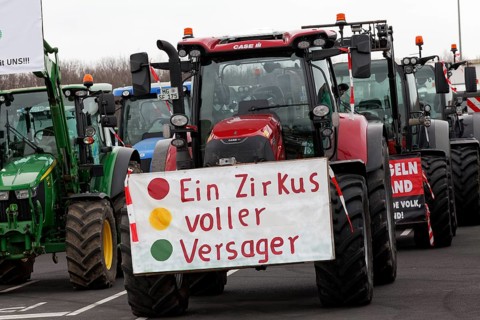 Tractor with sign, A circus full of losers, Farmer protests, Demonstration against policies of the