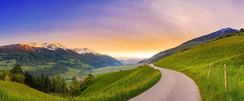 Mountain panorama of a small road in the South Tyrolean Alps, sunset, evening mood, path, Goldrain,