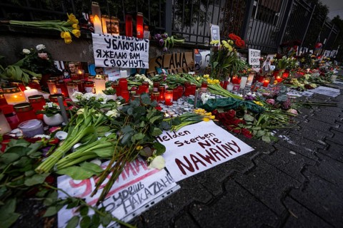 Photos, candles, grave lights and flowers for the Russian opposition leader Alexei Navalny, who