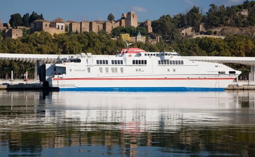 Alcantara Dos catamaran ferry at the quayside in new port development in Malaga, Spain with the