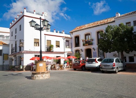 Village square in the hilltop Andalusian settlement of Comares, Malaga province, Spain, Europe